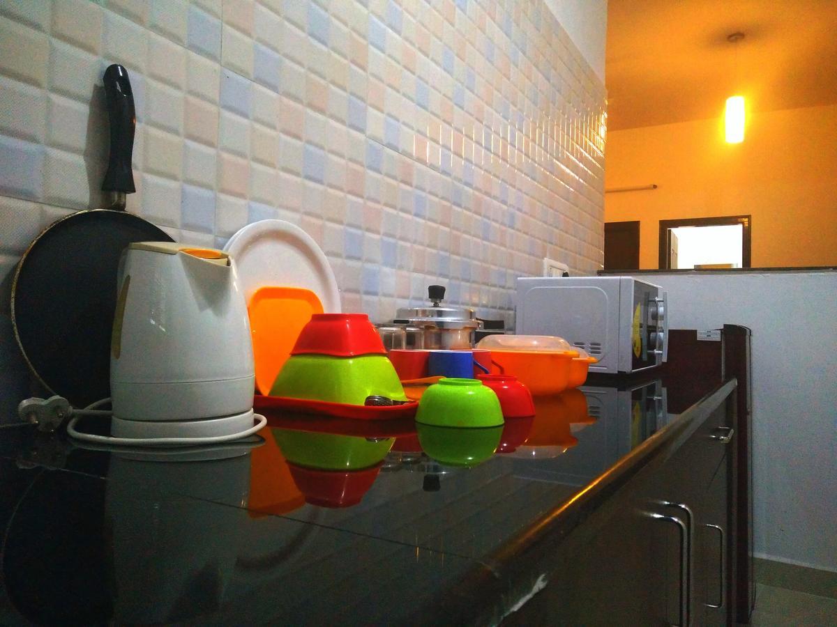 Varsha Enclave- Trinity House Aparthotel Mysore Buitenkant foto