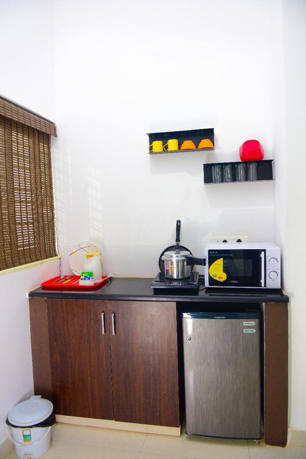 Varsha Enclave- Trinity House Aparthotel Mysore Buitenkant foto
